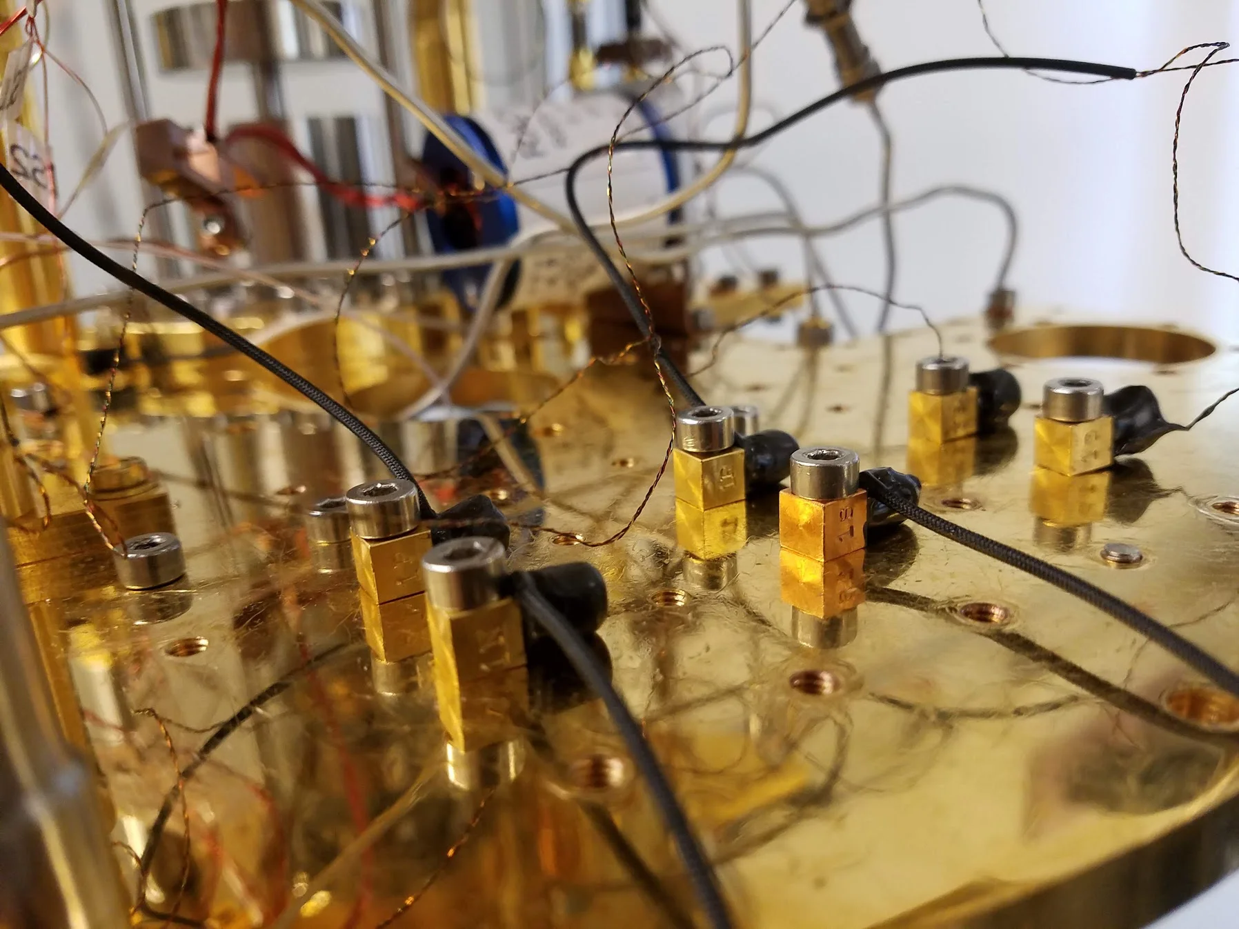 Fine wires and connectors on a physics research apparatus
